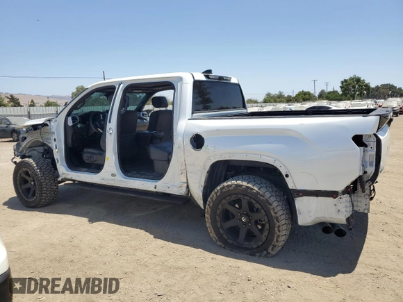 2022 Toyota Tundra Platinum with VIN 5TFNA5DB6NX003415, listed as a Copart auction lot 60794455 with 52,022 mi miles and Salvage title. Bid and sale history available at DreamBid. Image 2.