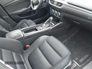 2016 Mazda 6 i Sport with VIN JM1GJ1U55G1472416, listed as a IAAI auction lot 41961622 with 157,315 mi miles and . Bid and sale history available at DreamBid. Image 5.