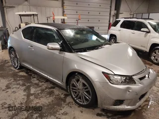 2011 Scion tC z VIN JTKJF5C76B3006789, wystawiony jako IAAI lot #41571706 z przebiegiem 92 169 mil mil oraz . Historia ofert i sprzedaży dostępna na DreamBid. Obrazek 1.