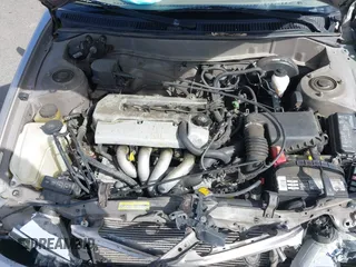 1999 Toyota Corolla VE with VIN 1NXBR12E4XZ182751, listed as a IAAI auction lot 41433066 with 56,904 mi miles and . Bid and sale history available at DreamBid. Image 10.