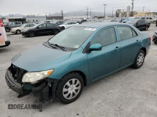 2010 Toyota Corolla with VIN 2T1BU4EE4AC517513, listed as a Copart auction lot 65677305 with 92,068 mi miles and Salvage title. Bid and sale history available at DreamBid. Image 1.