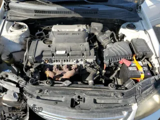 2009 Kia Spectra LX with VIN KNAFE221295606992, listed as a Copart auction lot 72767494 with 163,041 mi miles and Salvage Title. Bid and sale history available at carsss.com. Image 12.