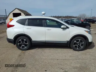 2017 Honda CR-V Touring with VIN 5J6RW2H95HL044505, listed as a IAAI auction lot 41856975 with 117,826 mi miles. Bid and sale history available at carsss.com. Image 13.