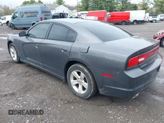 2014 Dodge Charger SE with VIN 2C3CDXBG8EH117241, listed as a IAAI auction lot 41952443 with 158,432 mi miles and . Bid and sale history available at DreamBid. Image 3.