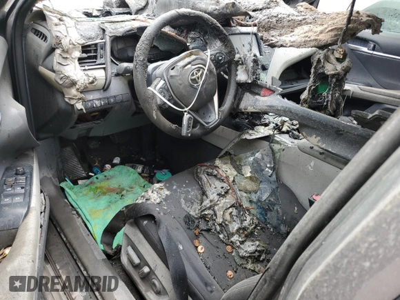 2018 Toyota Camry LE с VIN 4T1B11HK6JU573623, выставлен на аукционе Copart как лот 61994865 с пробегом Не указан миль и Списание • Salvage title. История ставок и продаж доступна на DreamBid. Изображение 8.