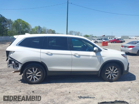 2019 Honda Pilot EX-L with VIN 5FNYF5H57KB038019, listed as a IAAI auction lot 41994410 with 126,738 mi miles and . Bid and sale history available at carsss.com. Image 14.