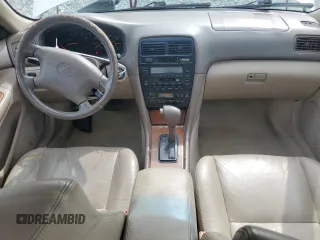 1998 Lexus ES 300 with VIN JT8BF28G4W5021187, listed as a Copart auction lot 60317445 with 258,403 mi miles and Salvage title. Bid and sale history available at DreamBid. Image 8.
