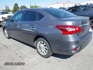 2019 Nissan Sentra SV z VIN 3N1AB7AP5KL621083, wystawiony jako IAAI lot #41838523 z przebiegiem 121 207 mil mil oraz . Historia ofert i sprzedaży dostępna na DreamBid. Obrazek 3.
