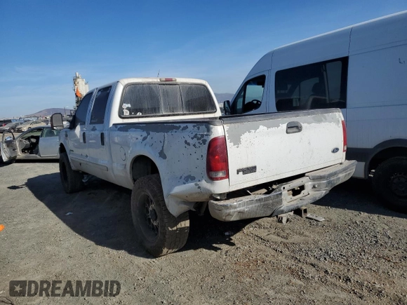 2002 Ford F-250 XL with VIN 1FTNW20F12EA44390, listed as a Copart auction lot 83888084 with 285,250 mi miles and Salvage Title. Bid and sale history available at DreamBid. Image 2.