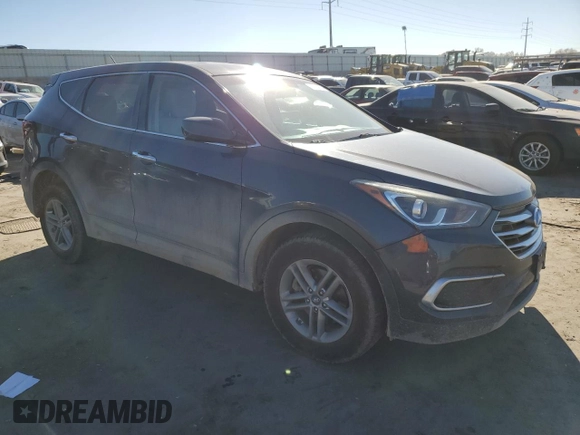 2018 Hyundai Santa Fe 2.4L z VIN 5XYZTDLB5JG568579, wystawiony jako Copart lot #82534794 z przebiegiem 130 032 mil mil oraz Szkoda całkowita • Salvage title. Historia ofert i sprzedaży dostępna na DreamBid. Obrazek 4.