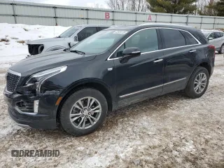 2023 Cadillac XT5 AWD Premium Luxury z VIN 1GYKNDRS6PZ222726, wystawiony jako Copart lot #42935135 z przebiegiem 24 916 mil mil oraz Szkoda całkowita • Salvage title. Historia ofert i sprzedaży dostępna na DreamBid. Obrazek 1.