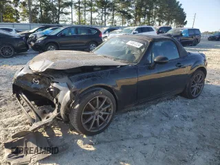 2006 Mazda MX-5 Miata Sport z VIN JM1NC25F360113827, wystawiony jako Copart lot #74561224 z przebiegiem 72 397 mil mil oraz Szkoda całkowita • Salvage title. Historia ofert i sprzedaży dostępna na DreamBid. Obrazek 1.