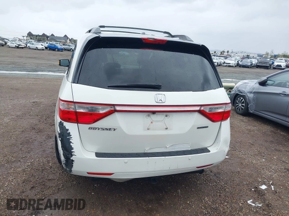 2013 Honda Odyssey Touring with VIN 5FNRL5H99DB041328, listed as a IAAI auction lot 41797520 with 148,523 mi miles and . Bid and sale history available at carsss.com. Image 16.