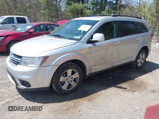 2011 Dodge Journey Mainstreet with VIN 3D4PH1FG4BT562414, listed as a IAAI auction lot 42122747 with 132,488 mi miles and . Bid and sale history available at DreamBid. Image 2.
