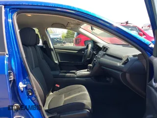 2018 Honda Civic LX with VIN 19XFC2F53JE020297, listed as a IAAI auction lot 42114807 with 124,058 mi miles and . Bid and sale history available at carsss.com. Image 5.