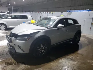 2018 Mazda CX-3 Grand Touring z VIN JM1DKFD72J0305961, wystawiony jako Copart lot #45953085 z przebiegiem 93 221 mil mil oraz Szkody całkowita. Historia ofert i sprzedaży dostępna na DreamBid. Obrazek 1.
