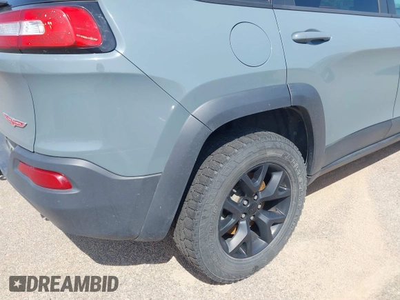 2015 Jeep Cherokee Trailhawk с VIN 1C4PJMBS7FW569497, выставлен на аукционе IAAI как лот 42744459 с пробегом 177 265 миль миль и . История ставок и продаж доступна на DreamBid. Изображение 6.