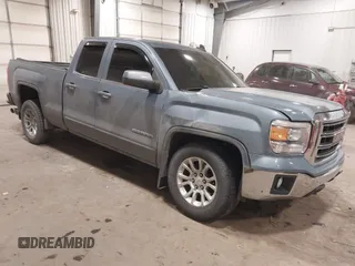 2015 GMC Sierra 1500 SLE with VIN 1GTV2UECXFZ285403, listed as a IAAI auction lot 41255076 with 71,498 mi miles. Bid and sale history available at carsss.com. Image 1.