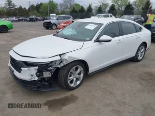 2024 Honda Accord LX z VIN 1HGCY1F20RA058803, wystawiony jako IAAI lot #42059758 z przebiegiem 13 071 mil mil oraz . Historia ofert i sprzedaży dostępna na DreamBid. Obrazek 2.