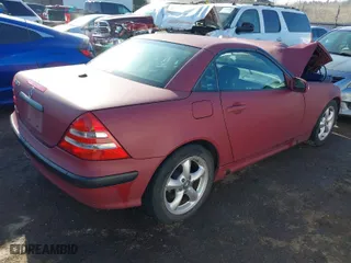 2001 Mercedes-Benz SLK-Class with VIN WDBKK65FX1F197839, listed as a IAAI auction lot 41224205 with 114,668 mi miles. Bid and sale history available at carsss.com. Image 4.