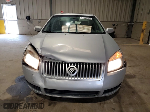 2006 Mercury Milan Premier with VIN 3MEHM08116R638785, listed as a Copart auction lot 64641395 with 127,178 mi miles and Salvage title. Bid and sale history available at DreamBid. Image 5.