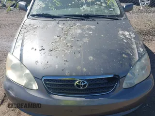 2005 Toyota Corolla CE with VIN 2T1BR30E55C400130, listed as a IAAI auction lot 42164407 with Not provided miles and . Bid and sale history available at DreamBid. Image 10.