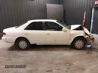 1999 Toyota Camry LE z VIN 4T1BG22K1XU888402, wystawiony jako IAAI lot #42483791 z przebiegiem 149 512 mil mil oraz . Historia ofert i sprzedaży dostępna na DreamBid. Obrazek 13.