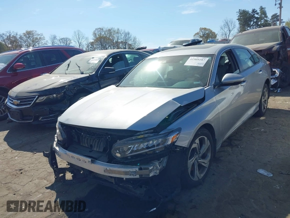 2018 Honda Accord EX-L z VIN 1HGCV2F57JA014214, wystawiony jako IAAI lot #41909287 z przebiegiem 81 388 mil mil oraz . Historia ofert i sprzedaży dostępna na DreamBid. Obrazek 2.