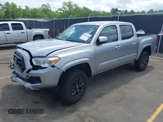 2023 Toyota Tacoma SR with VIN 3TYCZ5AN4PT149730, listed as a IAAI auction lot 42083146 with 31,731 mi miles and . Bid and sale history available at DreamBid. Image 2.