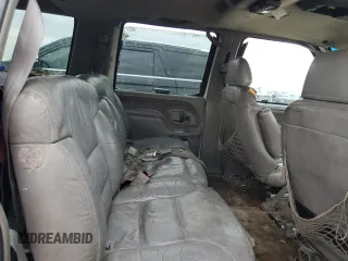 1999 Chevrolet Suburban with VIN 1GNEC16R7XJ418169, listed as a Copart auction lot 88995495 with 2,015,240 mi miles and Salvage title. Bid and sale history available at DreamBid. Image 11.