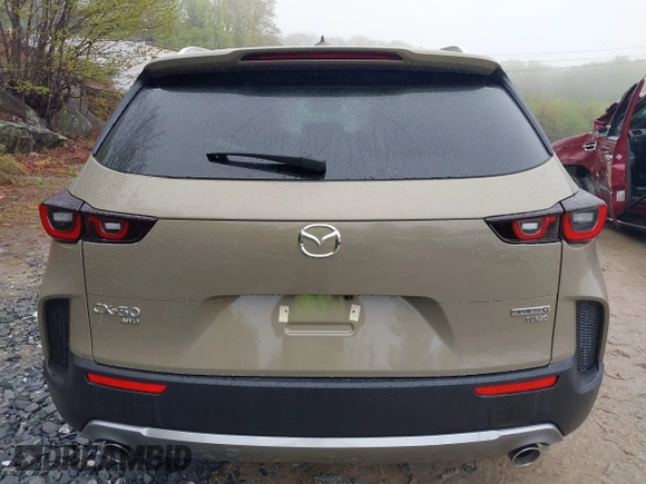 2025 Mazda CX-50 Premium z VIN 7MMVABDY2SN339010, wystawiony jako IAAI lot #42201002 z przebiegiem 36 mil mil oraz . Historia ofert i sprzedaży dostępna na DreamBid. Obrazek 16.