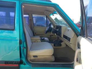 1996 Jeep Cherokee Sport z VIN 1J4FJ68S2TL103997, wystawiony jako IAAI lot #41517835 z przebiegiem 175 560 mil mil oraz . Historia ofert i sprzedaży dostępna na DreamBid. Obrazek 5.