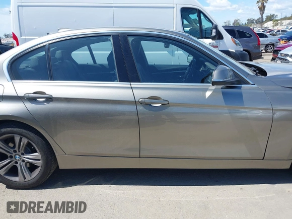 2018 BMW 3 Series 330i with VIN WBA8B9G58JNU98341, listed as a IAAI auction lot 41909777 with 85,396 mi miles and . Bid and sale history available at DreamBid. Image 14.
