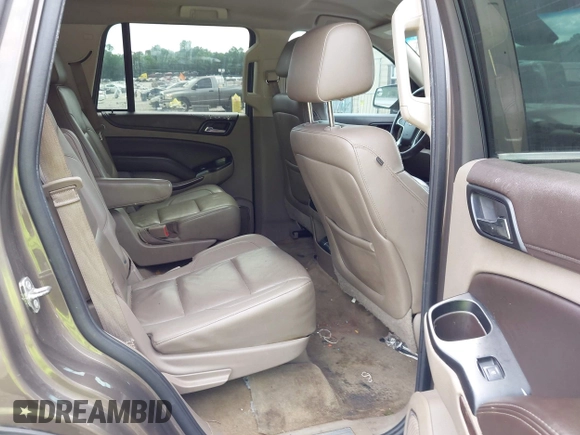 2015 Chevrolet Tahoe LT with VIN 1GNSCBKC5FR585138, listed as a IAAI auction lot 42420496 with 177,104 mi miles and . Bid and sale history available at DreamBid. Image 8.