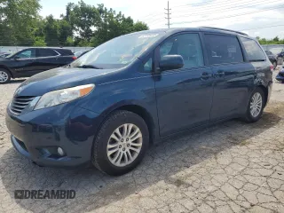 2011 Toyota Sienna XLE AAS with VIN 5TDYK3DCXBS040850, listed as a Copart auction lot 62155435 with 220,599 mi miles and Salvage title. Bid and sale history available at DreamBid. Image 1.