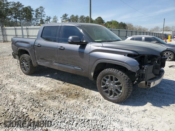 2023 Toyota Tundra Platinum with VIN 5TFNA5DBXPX073809, listed as a Copart auction lot 51221005 with 60,726 mi miles and Salvage title. Bid and sale history available at DreamBid. Image 4.