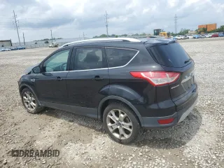 2015 Ford Escape Titanium with VIN 1FMCU9J91FUA38787, listed as a Copart auction lot 59749735 with 132,536 mi miles and Salvage title. Bid and sale history available at DreamBid. Image 2.