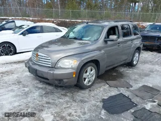 2011 Chevrolet HHR LT w/1LT with VIN 3GNBABFW1BS562781, listed as a IAAI auction lot 41694089 with 135,012 mi miles. Bid and sale history available at carsss.com. Image 2.