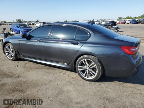2016 BMW 7 Series 750i with VIN WBA7F0C57GGL99332, listed as a Copart auction lot 56144533 with 95,626 mi miles. Bid and sale history available at carsss.com. Image 2.