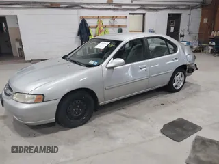 2001 Nissan Altima GXE with VIN 1N4DL01D71C241084, listed as a IAAI auction lot 41935585 with 136,114 mi miles. Bid and sale history available at carsss.com. Image 2.