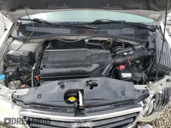 2004 Honda Odyssey EX-RES z VIN 5FNRL18804B121844, wystawiony jako Copart lot #53390135 z przebiegiem 284 065 mil mil oraz Szkoda całkowita • Salvage title. Historia ofert i sprzedaży dostępna na DreamBid. Obrazek 12.