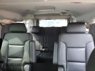 2015 Chevrolet Suburban LTZ with VIN 1GNSKKKC1FR624679, listed as a Copart auction lot 52957365 with 71,194 mi miles and Salvage Title. Bid and sale history available at DreamBid. Image 10.
