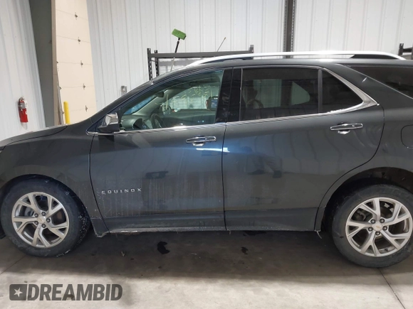2019 Chevrolet Equinox Premier with VIN 2GNAXXEV2K6127055, listed as a IAAI auction lot 41598381 with 132,126 mi miles and . Bid and sale history available at DreamBid. Image 14.