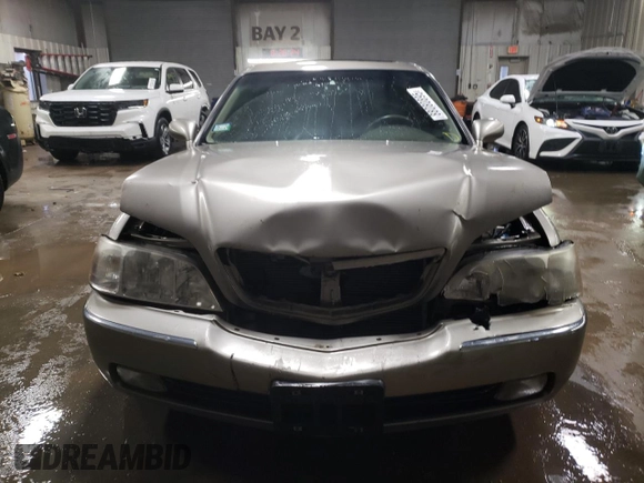 2002 Acura RL z VIN JH4KA96502C012064, wystawiony jako Copart lot #88080895 z przebiegiem 107 477 mil mil oraz Szkoda całkowita • Salvage title. Historia ofert i sprzedaży dostępna na DreamBid. Obrazek 5.