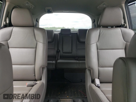 2014 Honda Odyssey Touring with VIN 5FNRL5H90EB014360, listed as a Copart auction lot 56699845 with 180,913 mi miles and Salvage title. Bid and sale history available at DreamBid. Image 10.