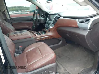 2016 Chevrolet Tahoe LTZ with VIN 1GNSKCKC7GR171904, listed as a IAAI auction lot 41967060 with 223,334 mi miles and . Bid and sale history available at DreamBid. Image 5.