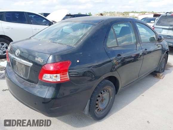2008 Toyota Yaris with VIN JTDBT923984013457, listed as a IAAI auction lot 42104365 with 242,157 mi miles. Bid and sale history available at carsss.com. Image 4.
