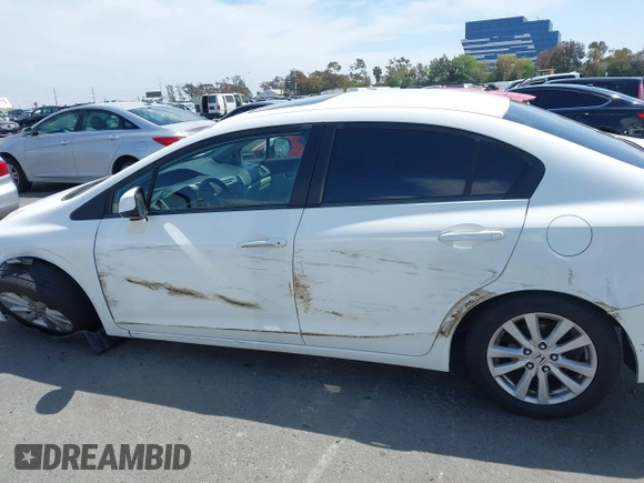 2012 Honda Civic EX-L with VIN 19XFB2F92CE381075, listed as a IAAI auction lot 42024543 with 102,703 mi miles and . Bid and sale history available at DreamBid. Image 14.