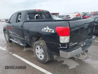 2012 Toyota Tundra z VIN 5TFRM5F15CX040630, wystawiony jako IAAI lot #42213728 z przebiegiem 242 469 mil mil oraz . Historia ofert i sprzedaży dostępna na DreamBid. Obrazek 3.