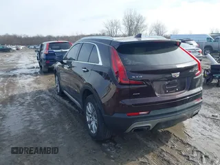 2020 Cadillac XT4 AWD Premium Luxury with VIN 1GYFZDR4XLF085471, listed as a IAAI auction lot 41528080 with 58,136 mi miles. Bid and sale history available at carsss.com. Image 3.